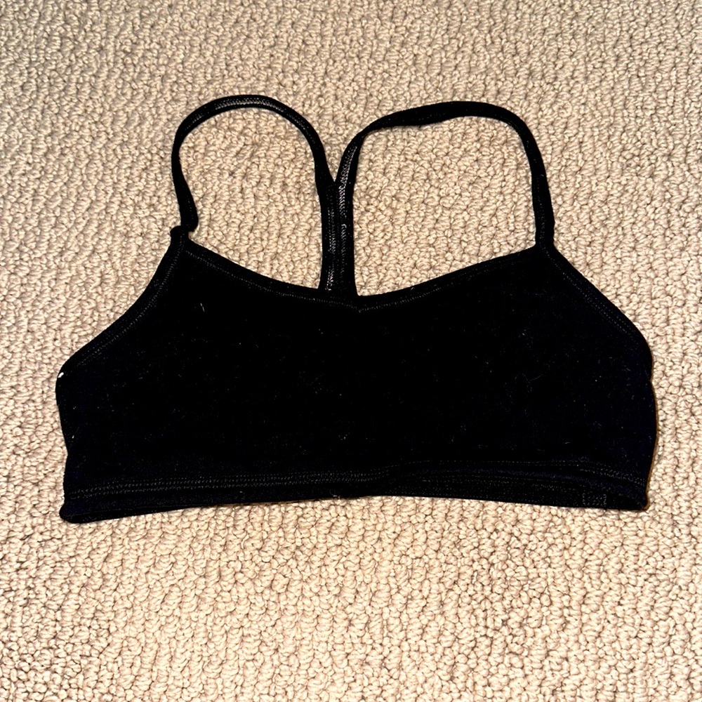 This is a black Ivivva sports bra. It is size 10.